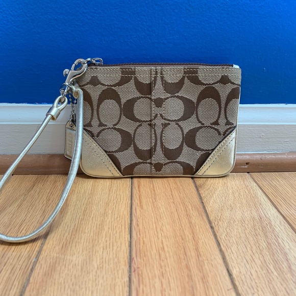Coach Handbags - Coach Signature Wristlet with Gold Trim EUC